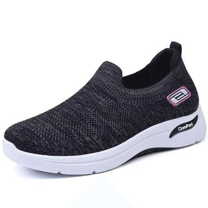 Zapatilla Marie Mujer negra ergonómica con suela blanca anti-impacto, calce cómodo para actividades diarias