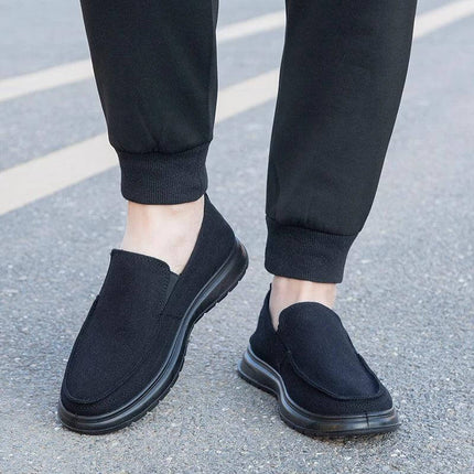 Zapatos de lona casuales negros para hombre, ideales para caminar. Calzado cómodo y versátil, perfecto para uso diario.
